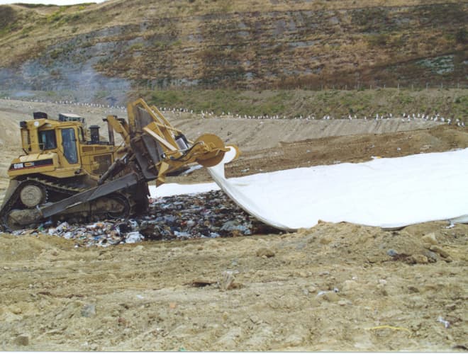 Placing cover at construction site